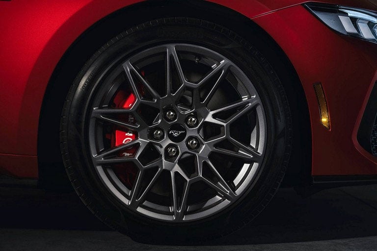 2024 Ford Mustang® model with a close-up of a wheel and brake caliper | Burlington Ford in Burlington CO